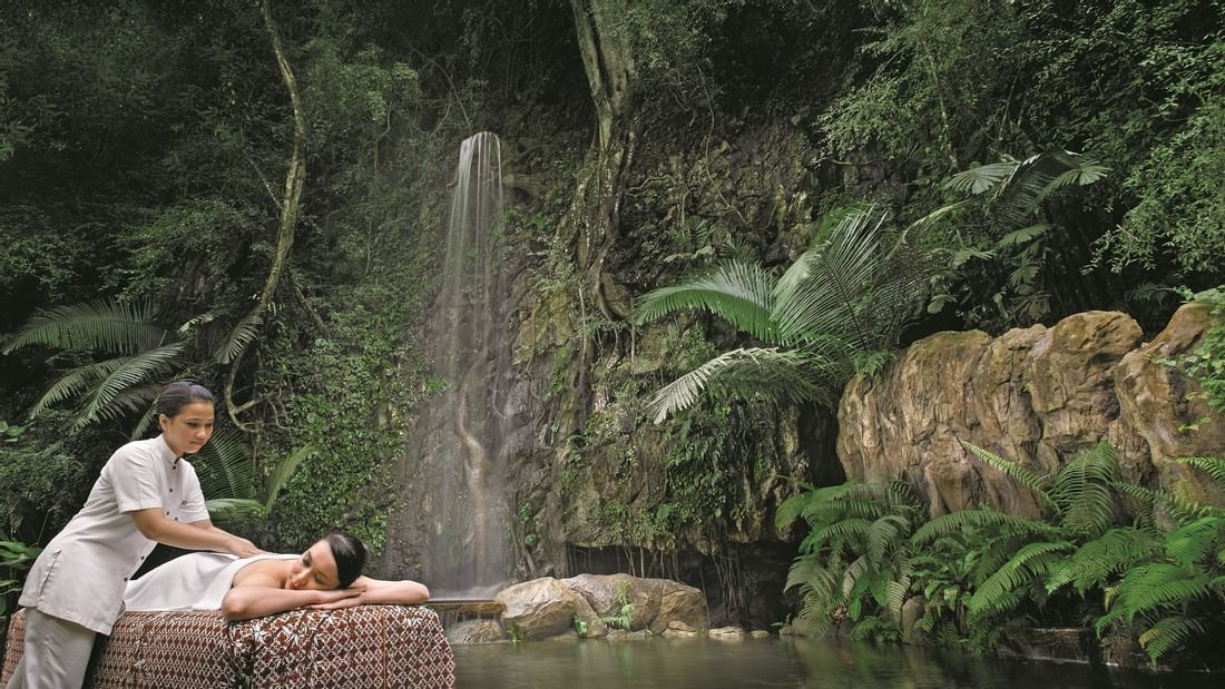 Luxury wellness retreats southeast asia The Banjaran Hotsprings Retreat waterfall